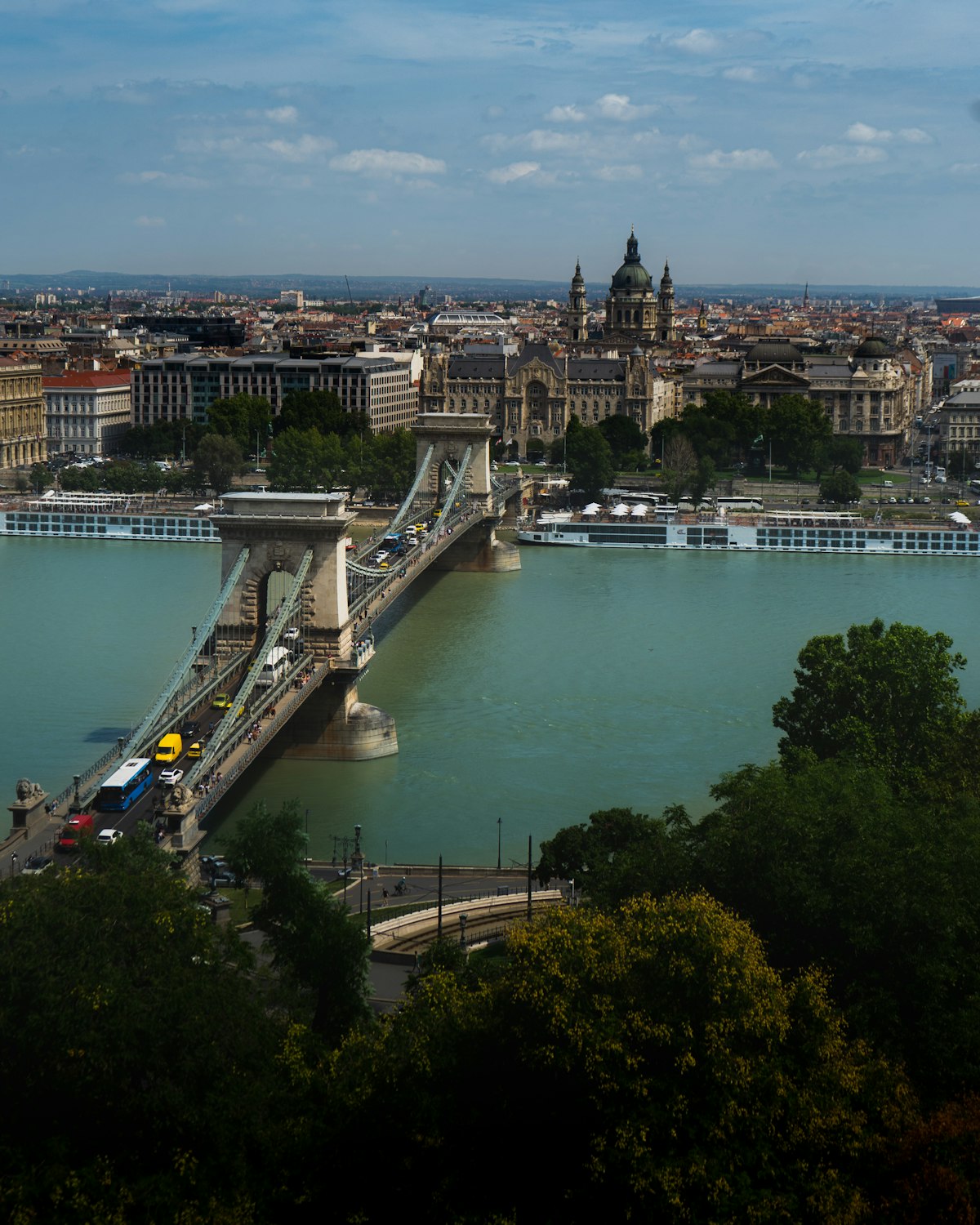 Budapest September — aerial view of the Széchenyi Chain Bridge over the Danube in clear autumn light