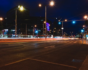 Street lighting project illuminating a busy urban area at night.