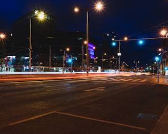 Street lighting project illuminating a busy urban area at night.