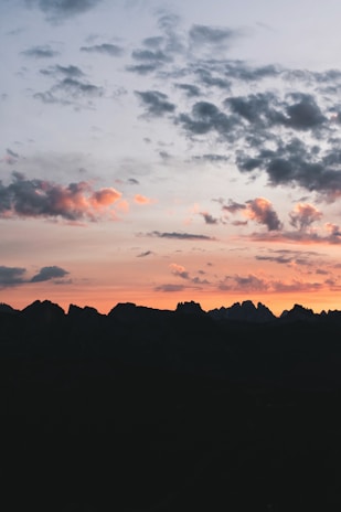 A scenic view of the Rhön mountains at sunset.