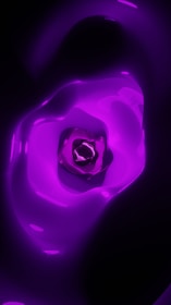 Close-up of a vibrant purple-themed handcrafted art piece glowing softly.