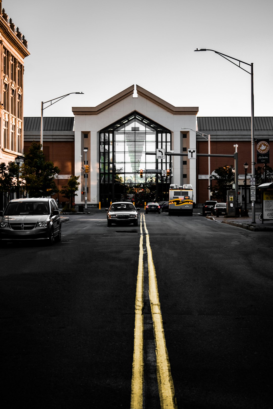 cars on road near buildings