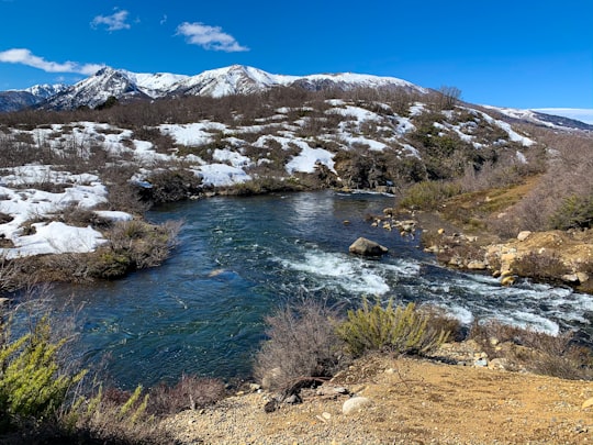 snow mountain and body of water in Lonquimay Chile