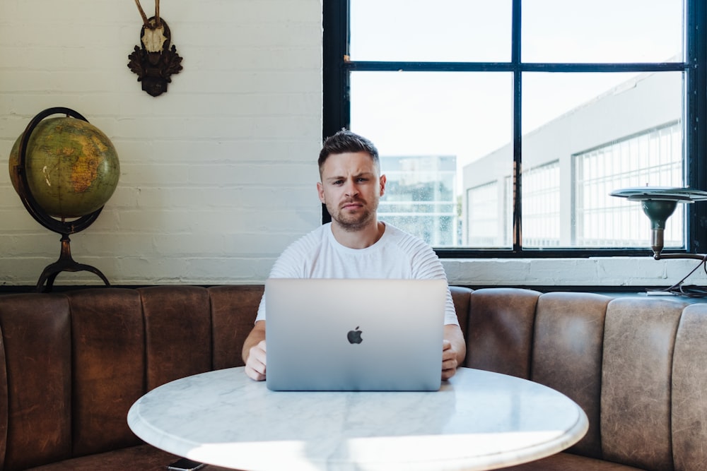 man sitting infront of table