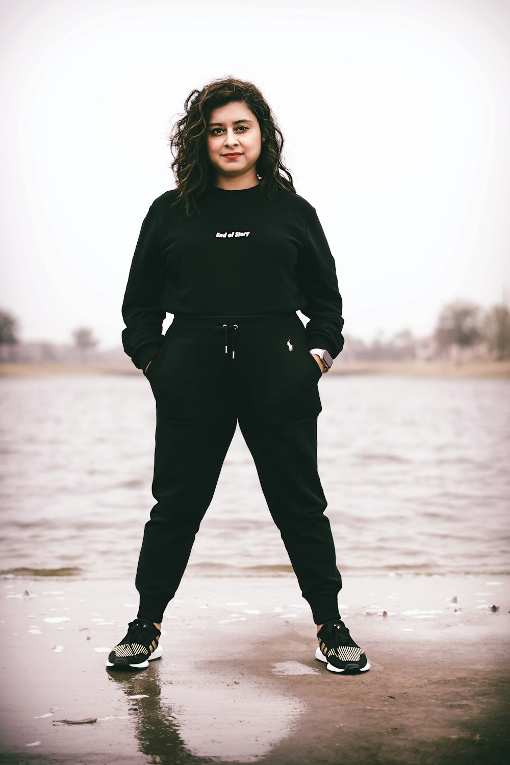 woman wearing black tracksuit