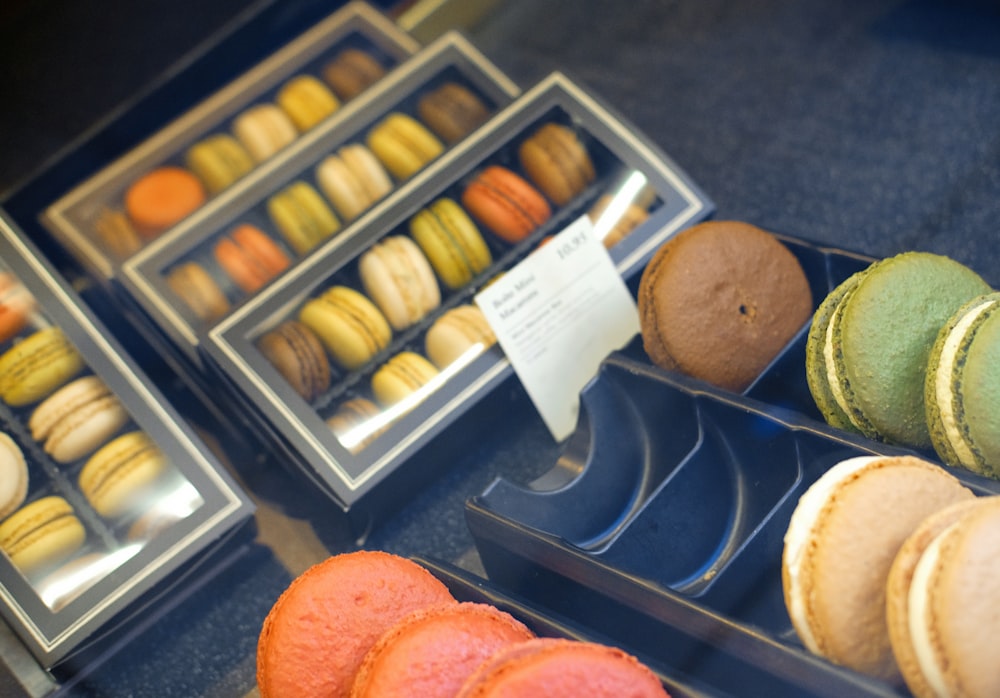 a display case filled with lots of different types of macaroons