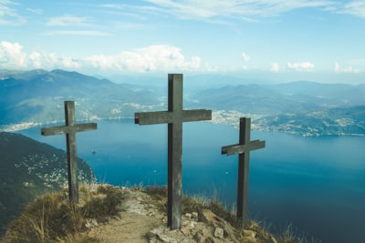 three black wooden cross during daytime christianity google meet background