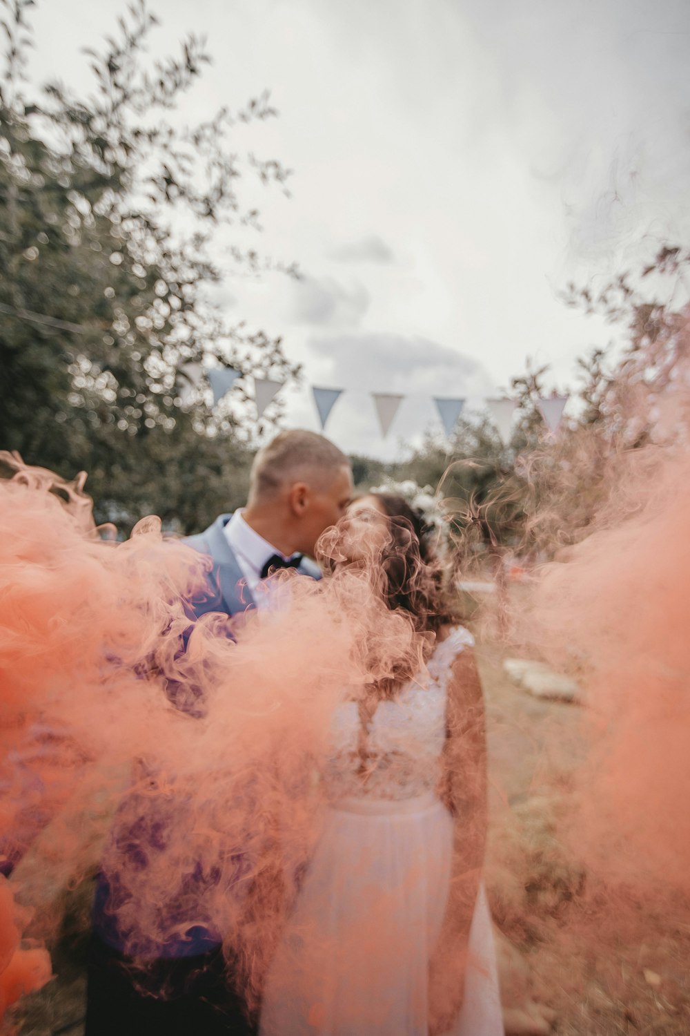 man and woman kissing each other