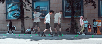Adult student confidently skating along a city street during a guided urban route.