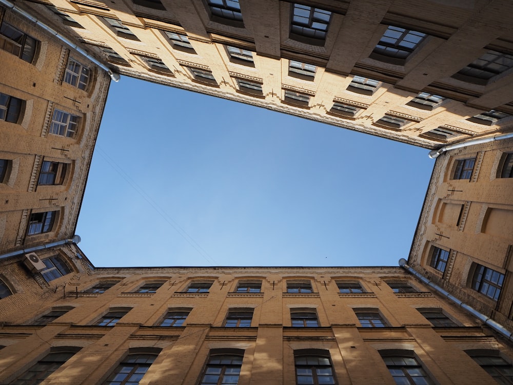 low angle photography of building under clear sky