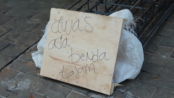 A simple construction sign indicating website maintenance in progress.