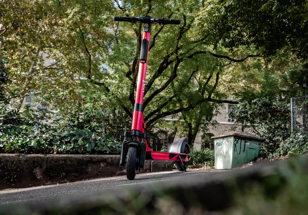 red and black kick scooter