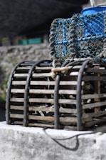 a close up of a basket on a ledge