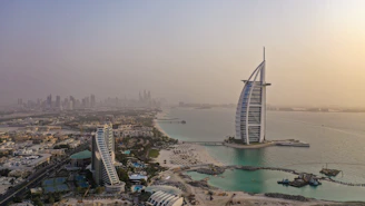 Aerial view of Al Mamzar waterfront showing proximity to Dubai skyline.