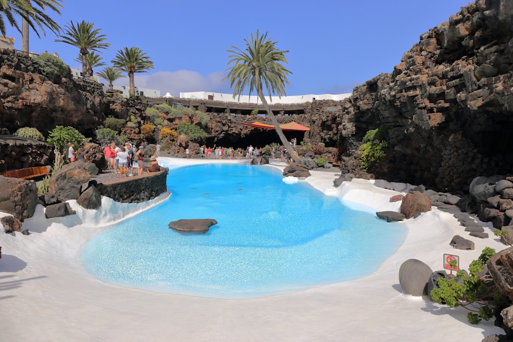 outdoor swimming pool under clear blue sky