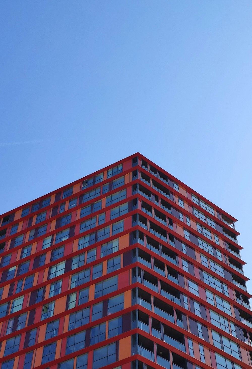 high-rise building under blue sky