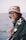woman wearing green jacket and bucket hat