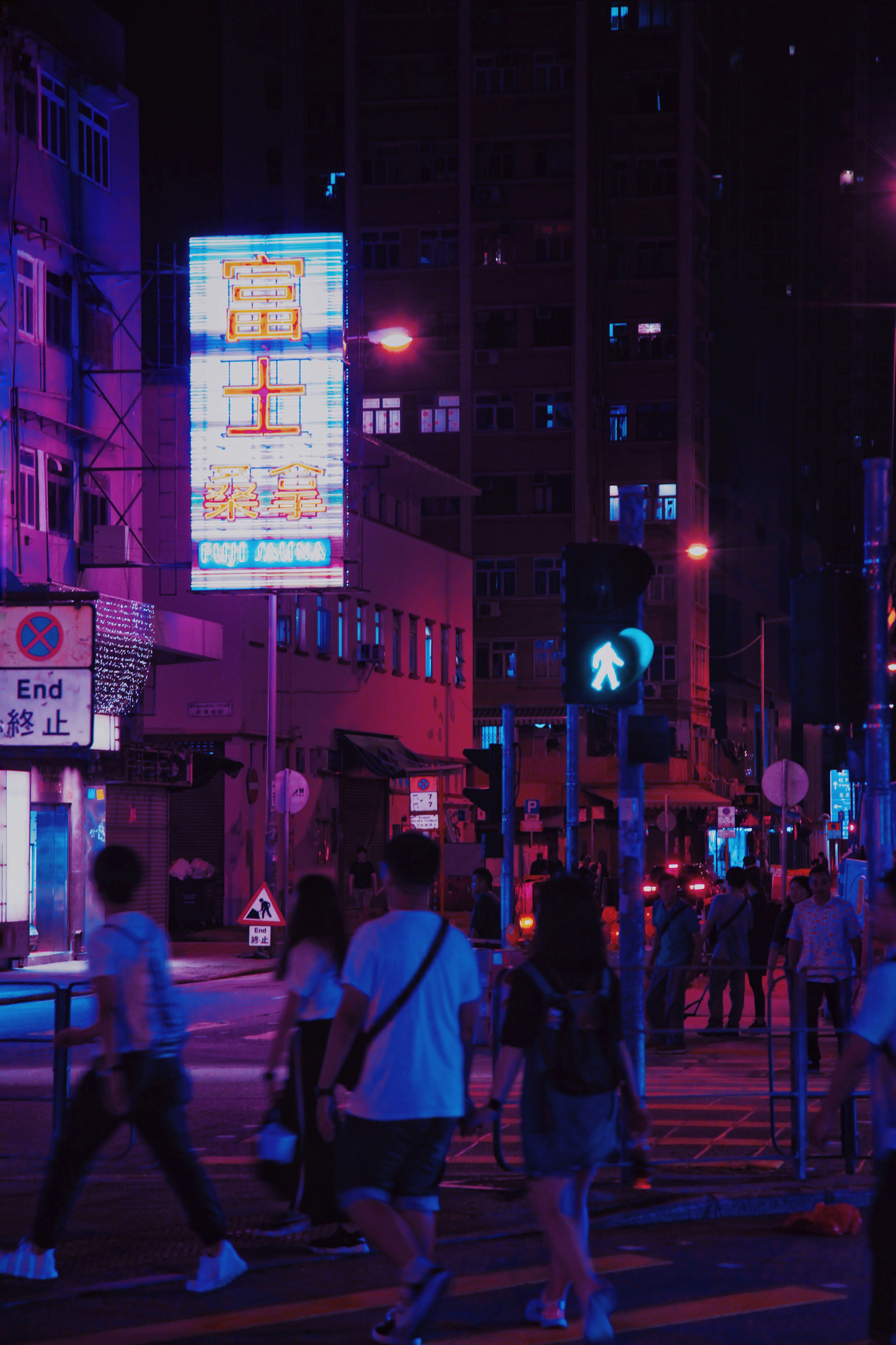 people crossing pedestrian lane