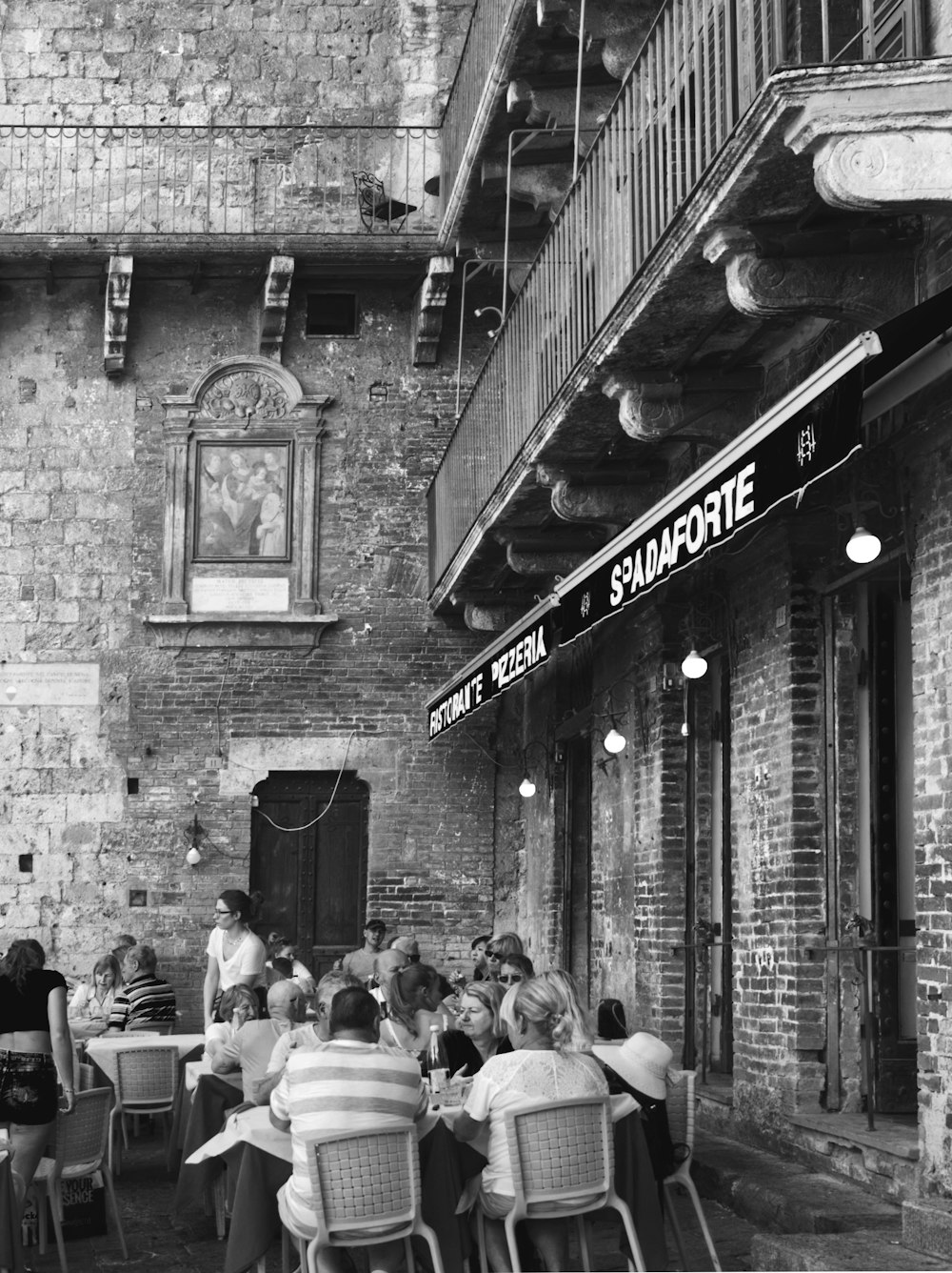 gray-scale photo of restaurant facade