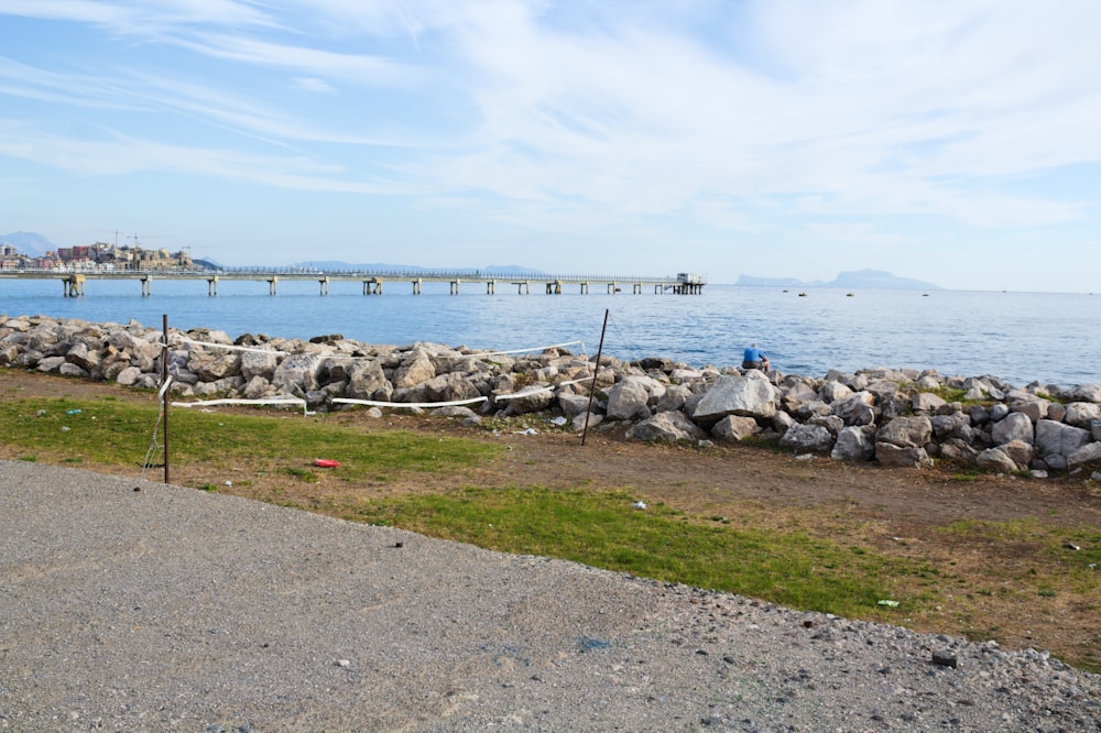 gray stones near sea during daytime photo