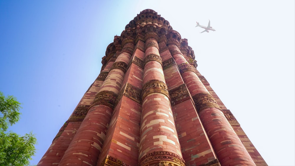 low angle photo of red and black concrete building