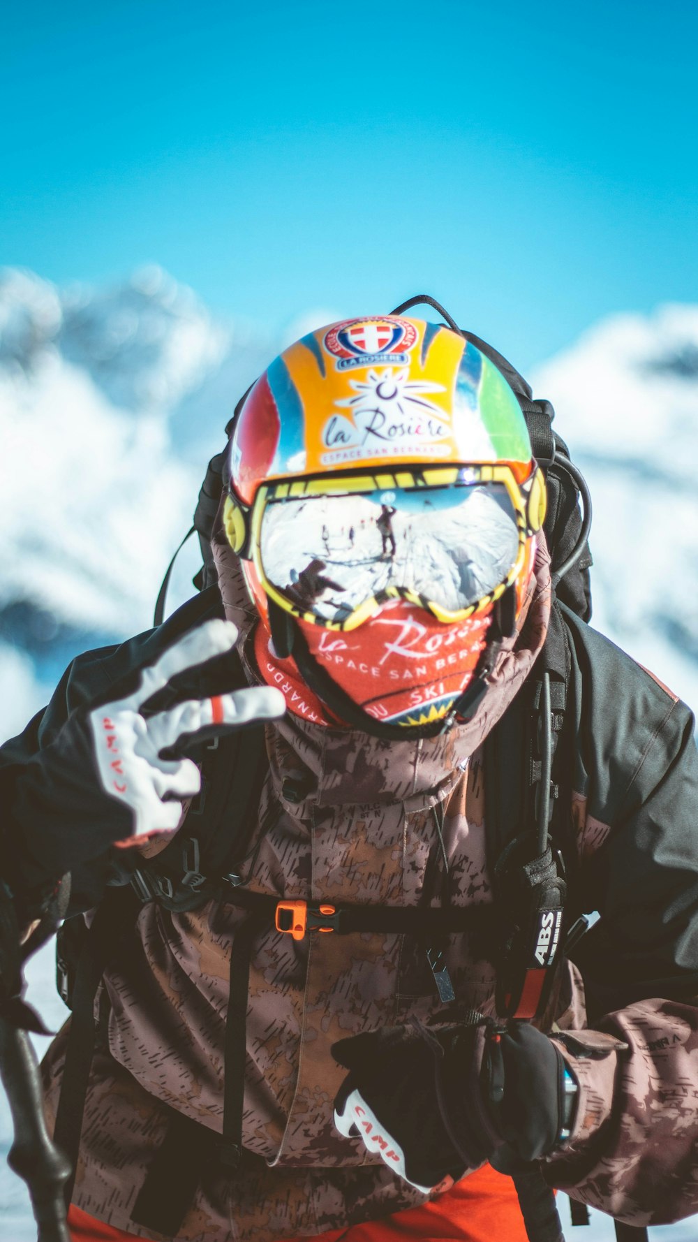 person wearing yellow and green helmet