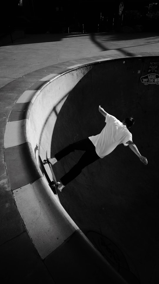 grayscale photography of man skateboarding in Thunder Bay Canada