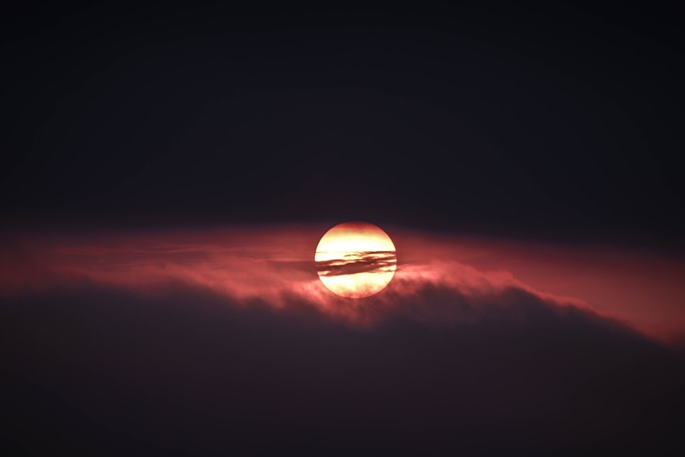 clouds slightly covering moon