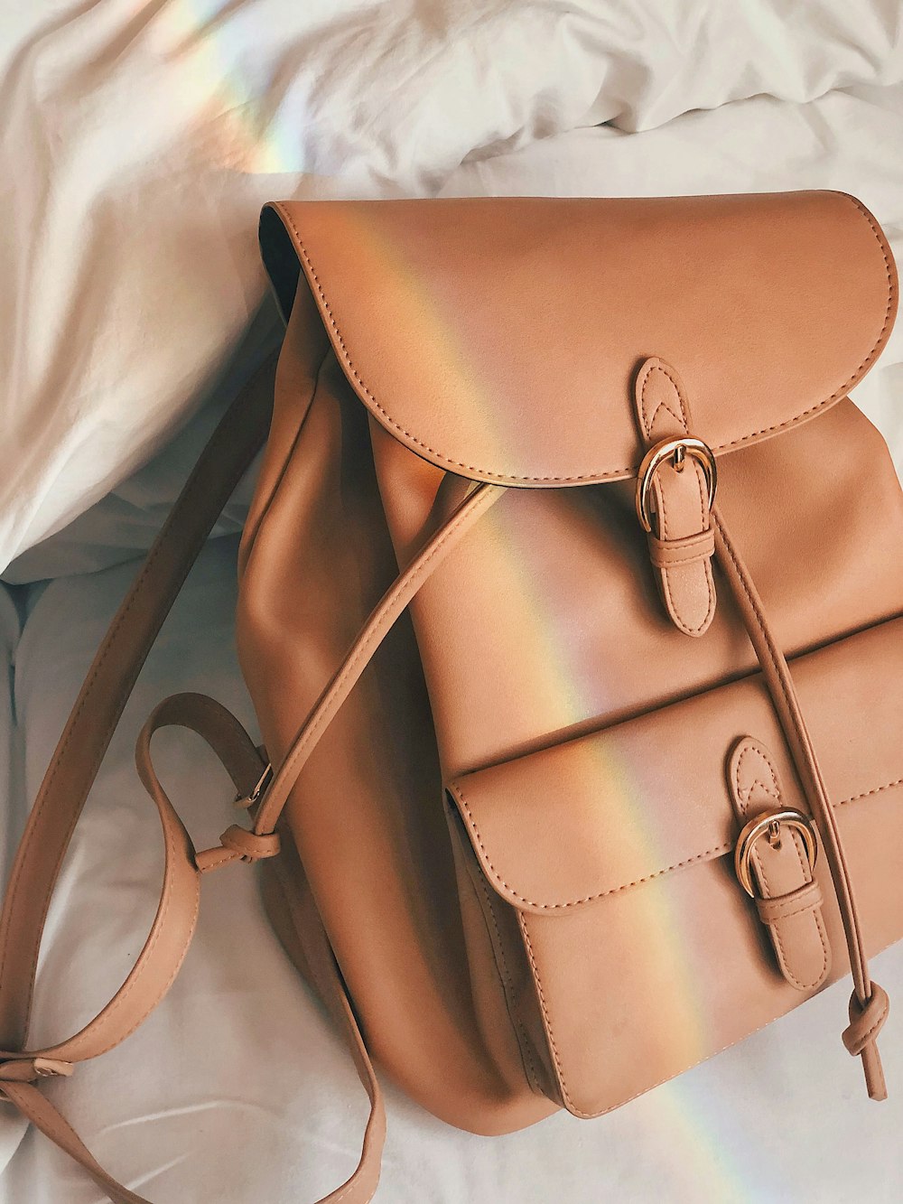 brown leather backpack