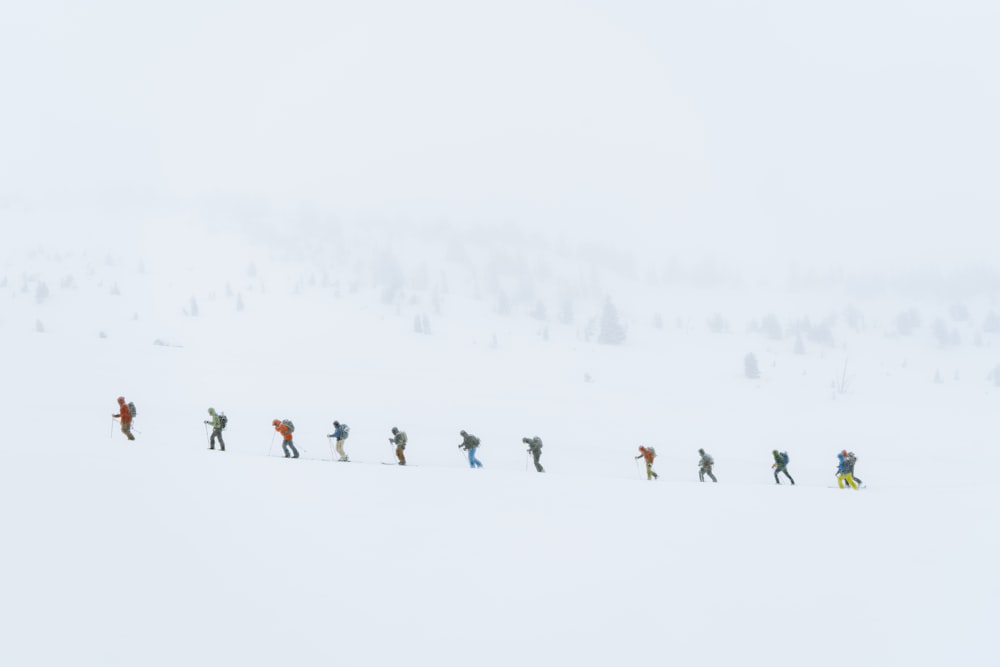 people ice skating on snow grund