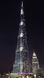 well lighted high rise building at night