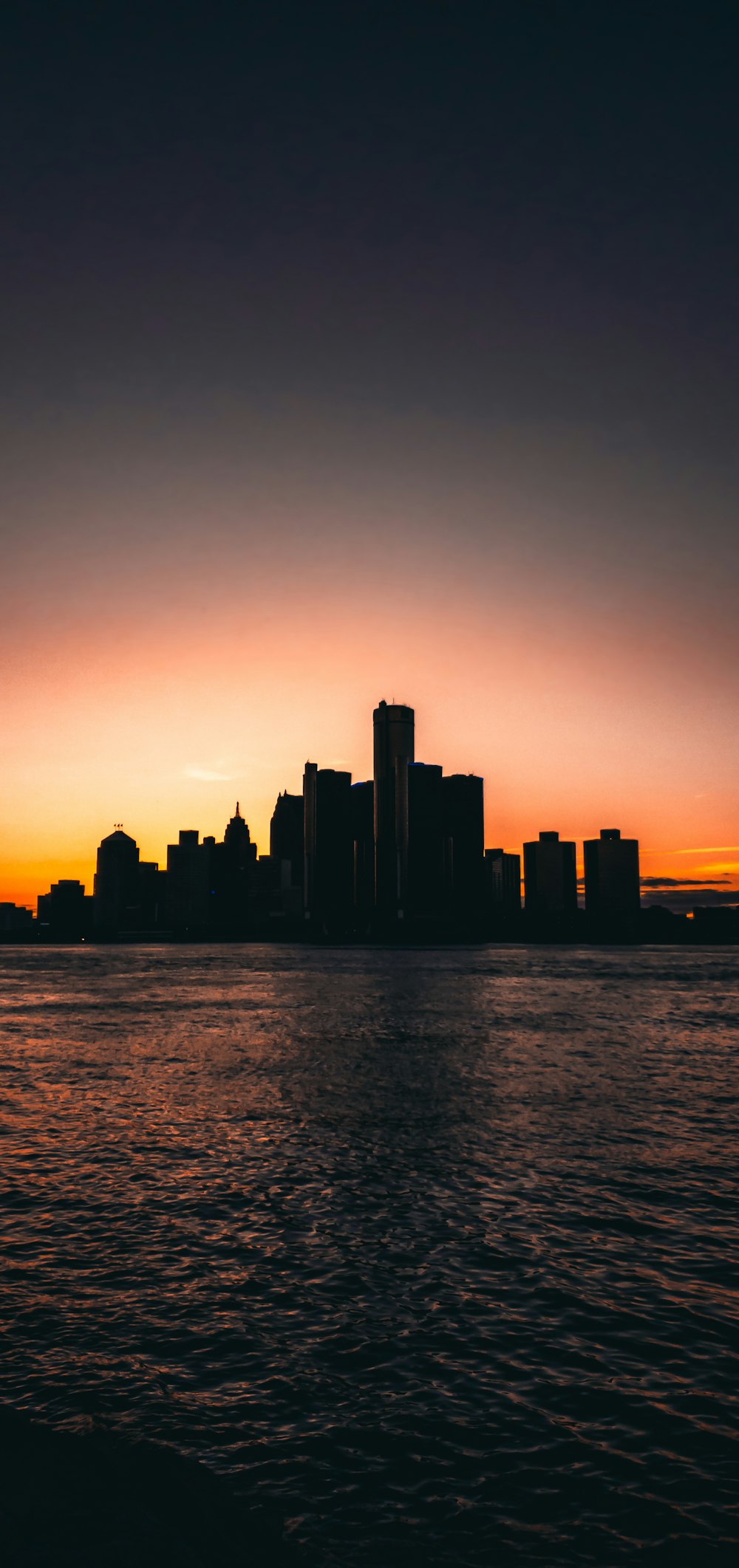 silhouette photography of building during golden hor