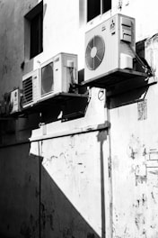 greyscale photography of AC units