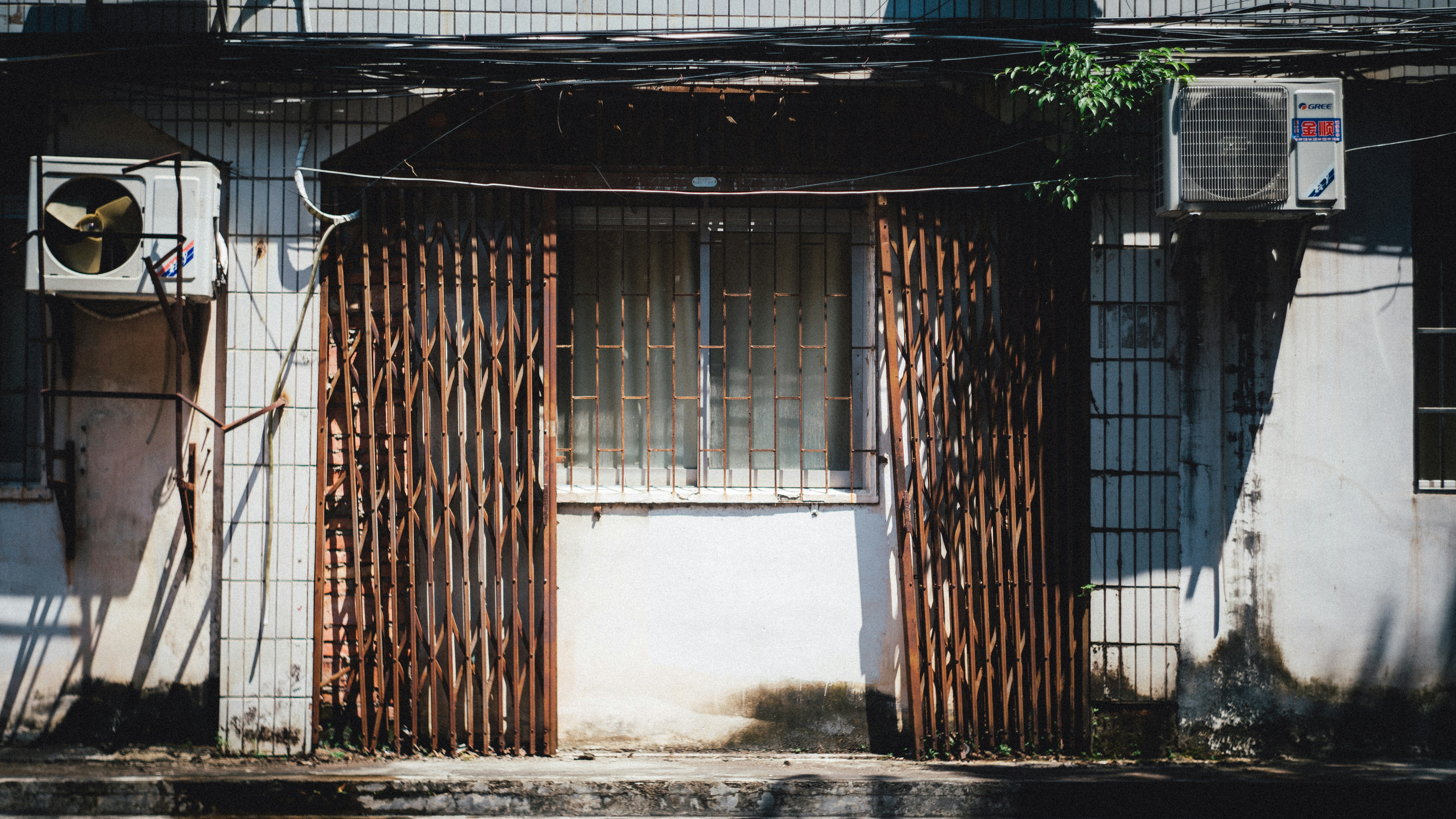 Image of a heavy wooden garage door that requires robust springs. - garage door spring repair price