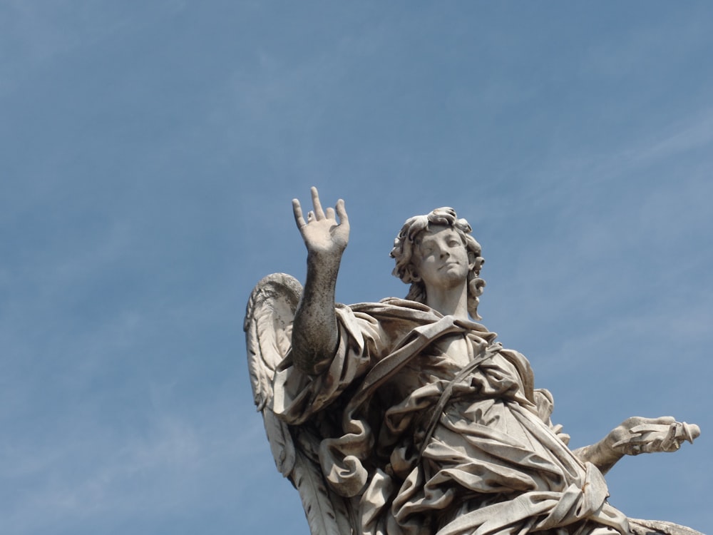 angel with right hand up statue