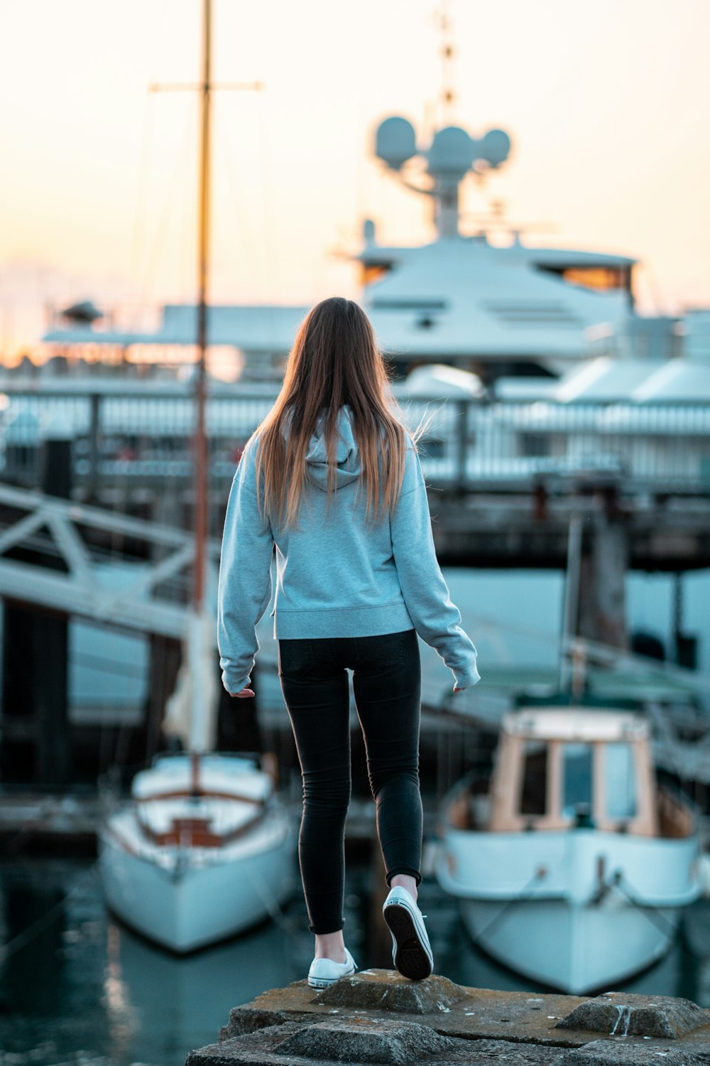 girl standing on dock