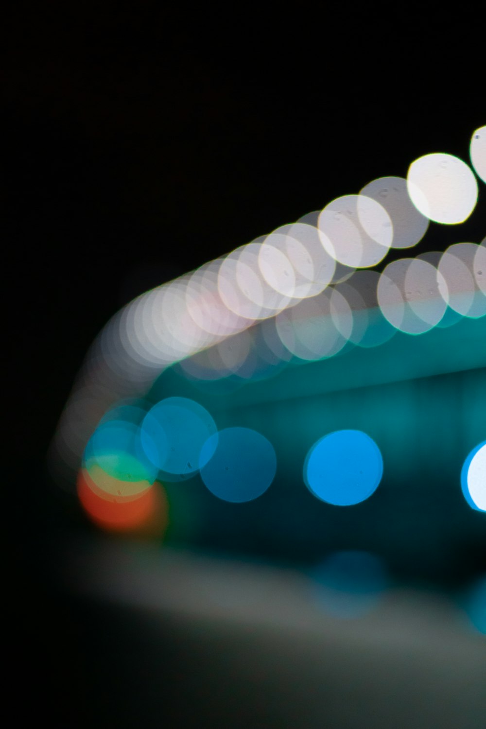 a blurry photo of a city street at night