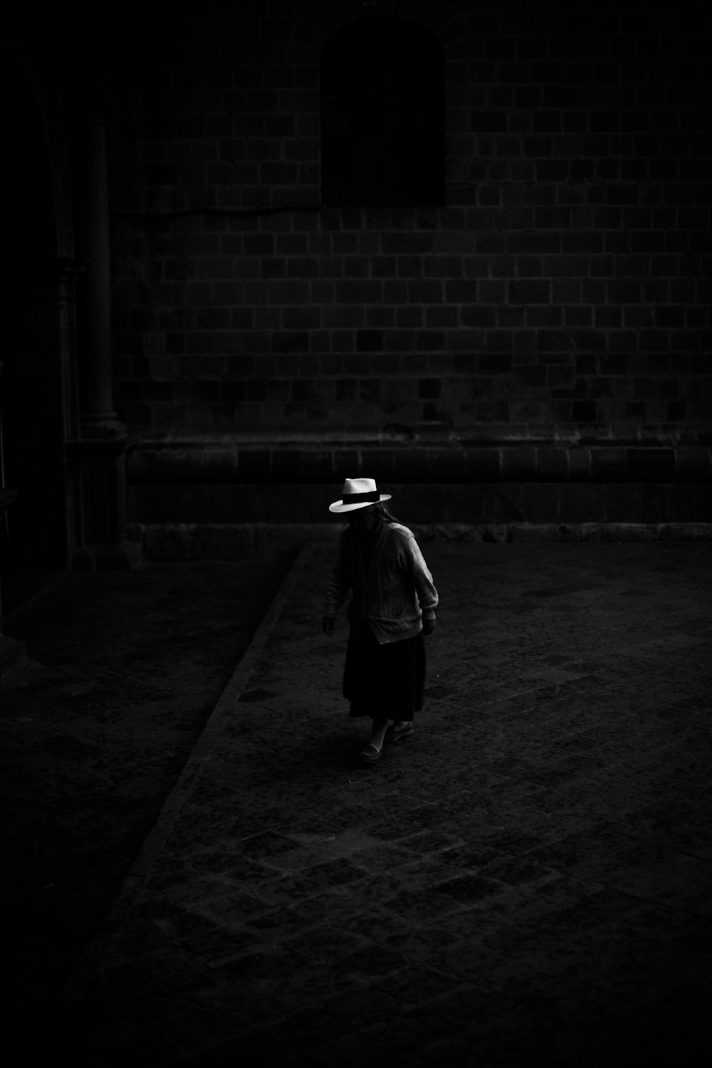 woman standing on the dark