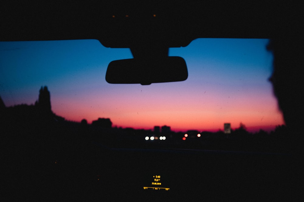 silhouette of man inside vehicle