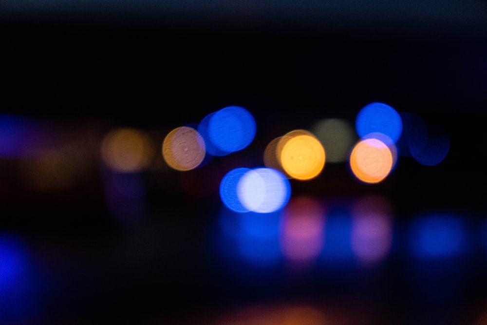 a blurry photo of a city street at night