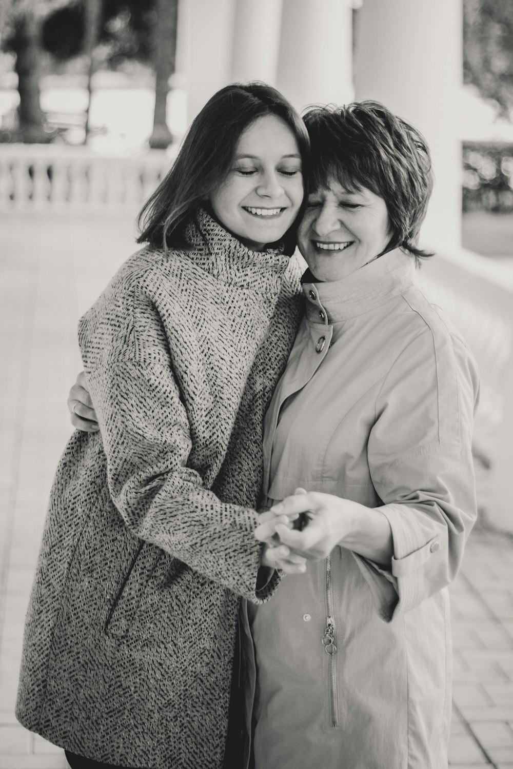 two women holding hands