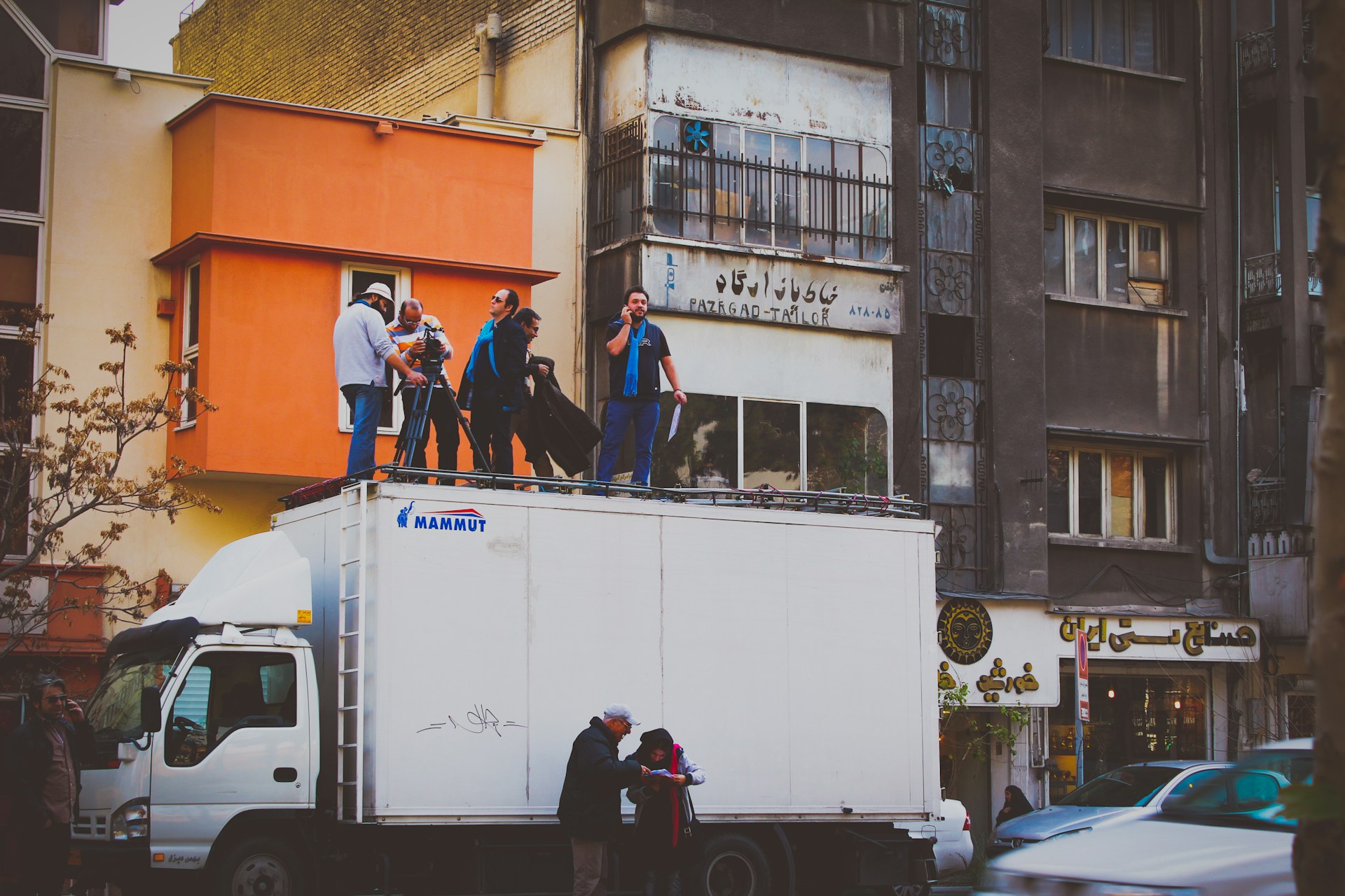 black and brown leather padded tub sofa