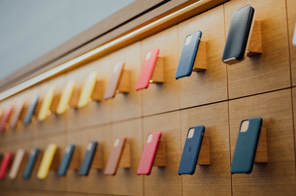 brown wooden smartphone rack inside room