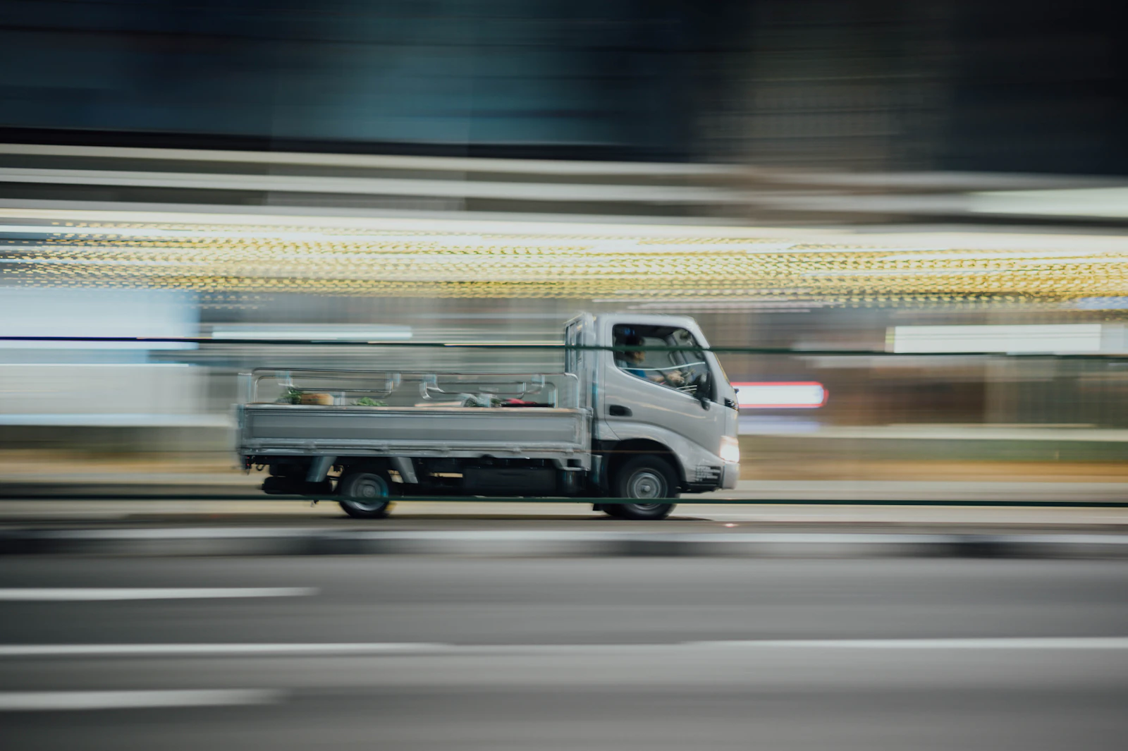 Loaded bakkie transporting cargo on a national route