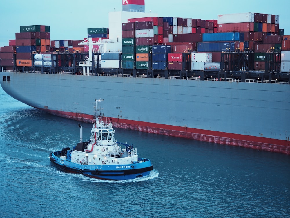 white and red cargo vessel