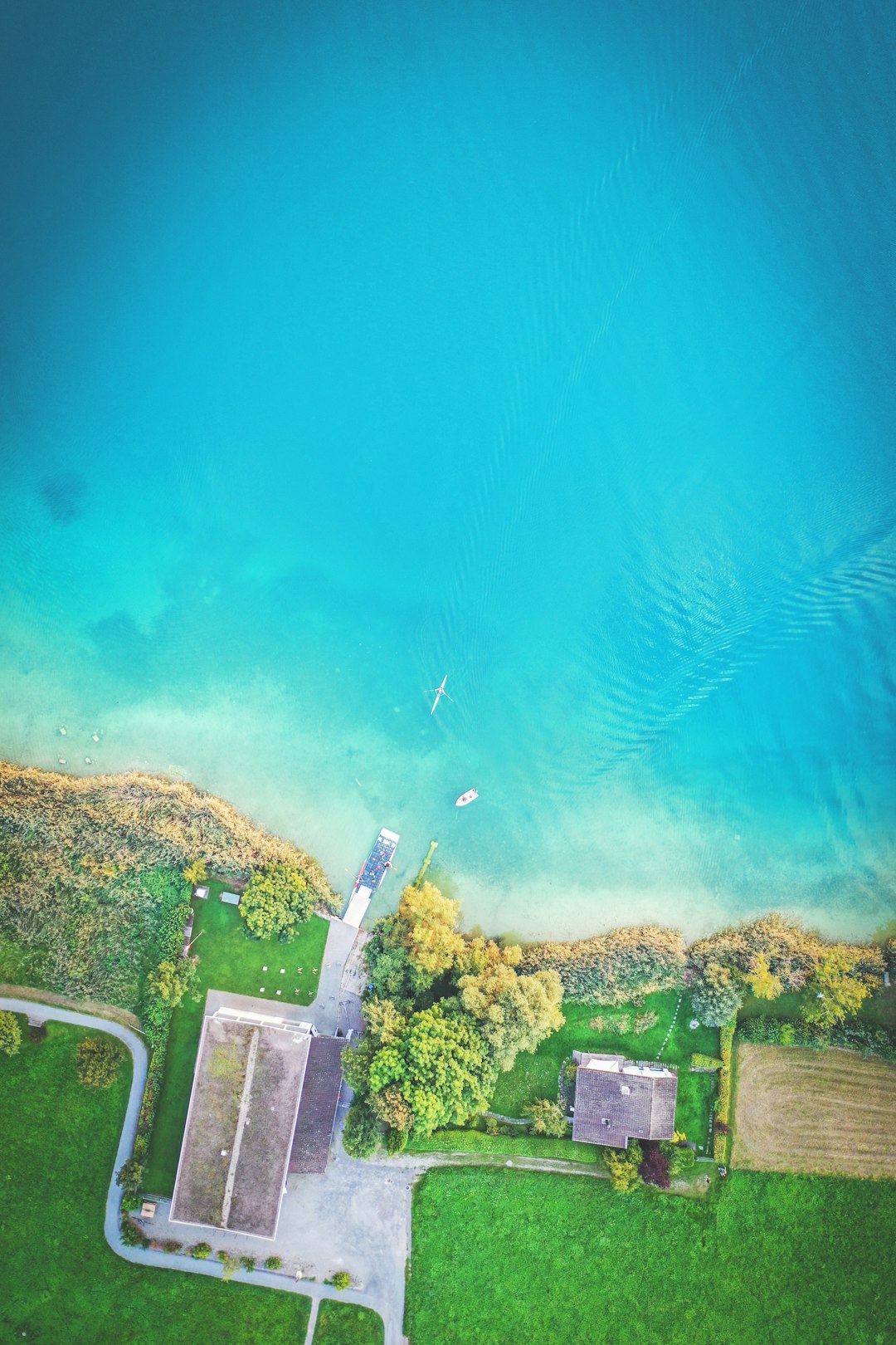 aerial photography of building beside body of water during daytime