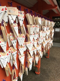 Animal wall stickers of playful foxes and owls arranged on a children's bedroom wall.