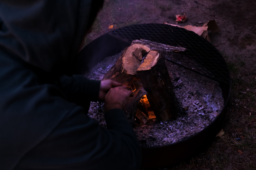 person burning woods