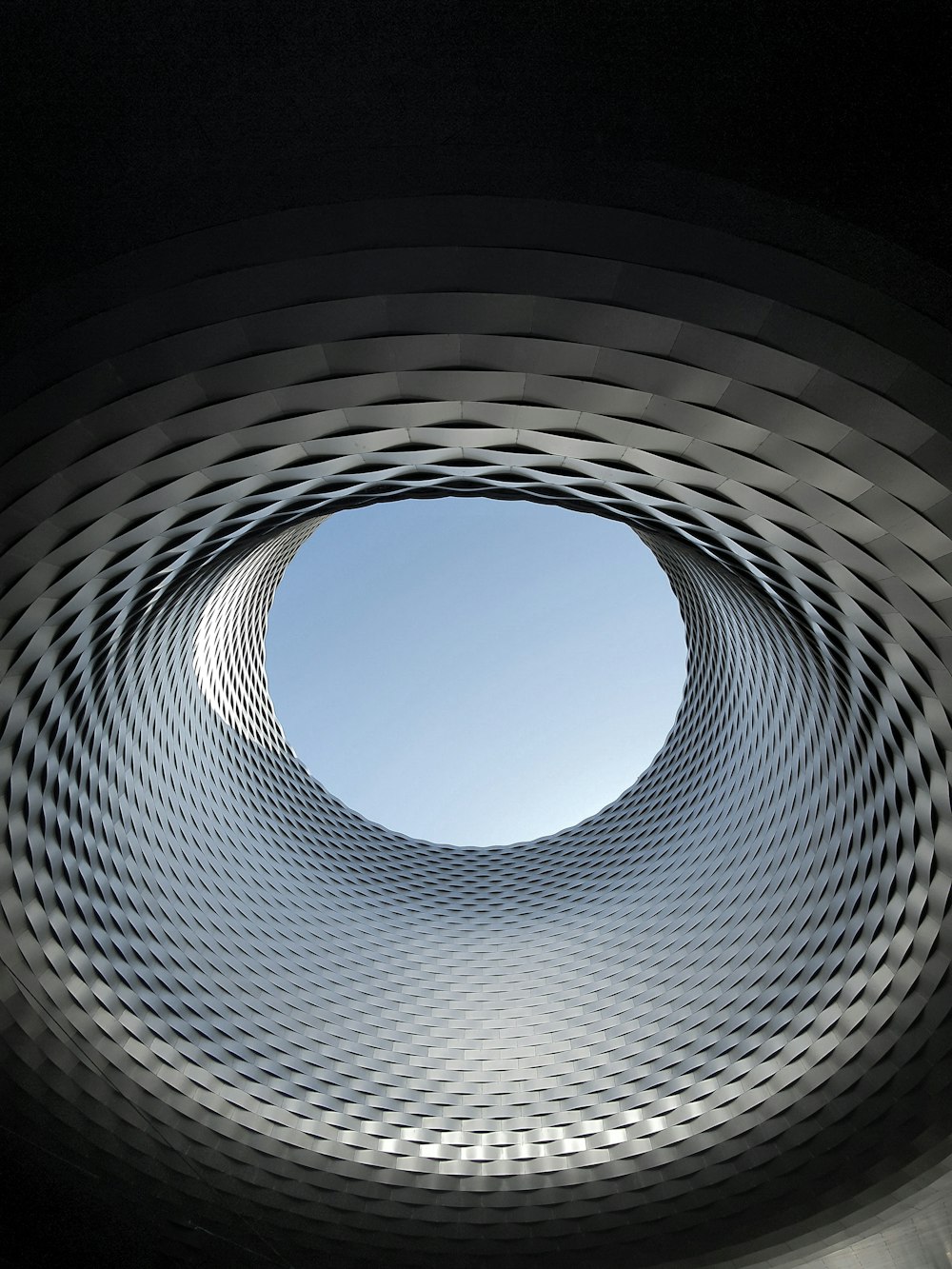 a circular hole in the ceiling of a building