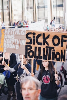 sick of pollution placard